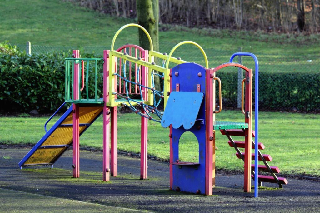 A great place to have an exercise class would be the playground. 